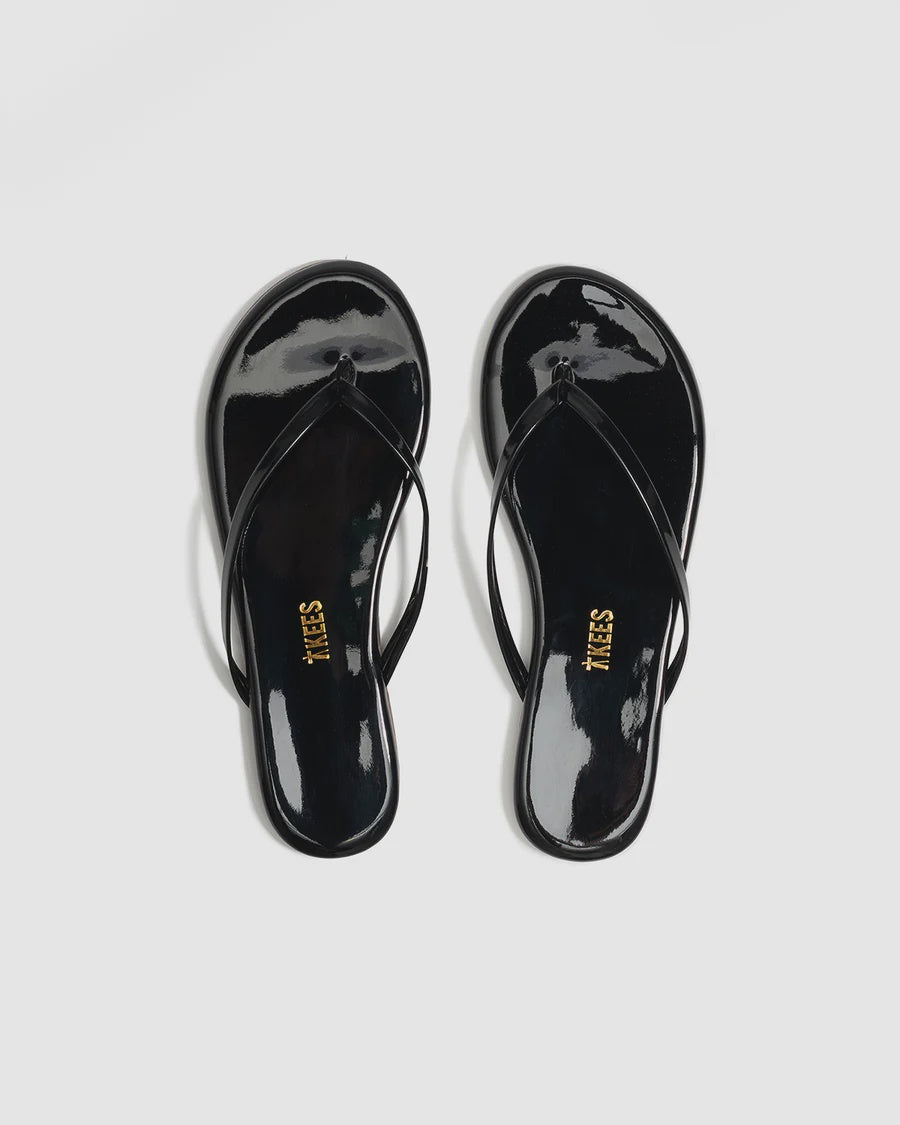 Lily Glosses Leather Flip Flops in Licorice
