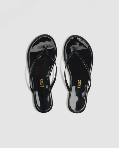 Lily Glosses Leather Flip Flops in Licorice