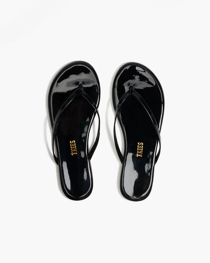 Lily Glosses Leather Flip Flops in Licorice