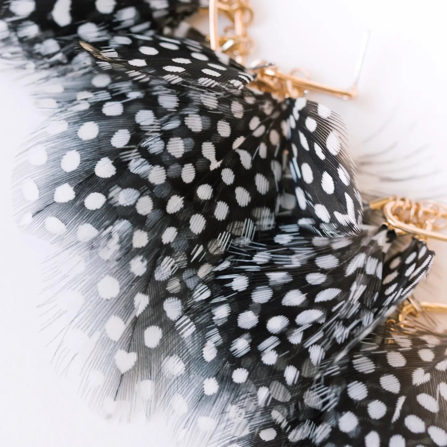 Spotted Feather Tassel Earrings